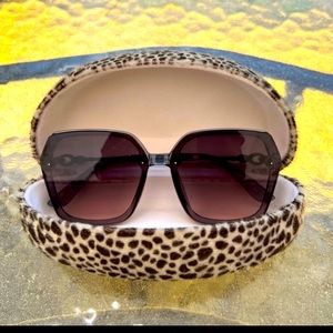 Cute square oversized sunglasses with animal print case. Only worn to model.